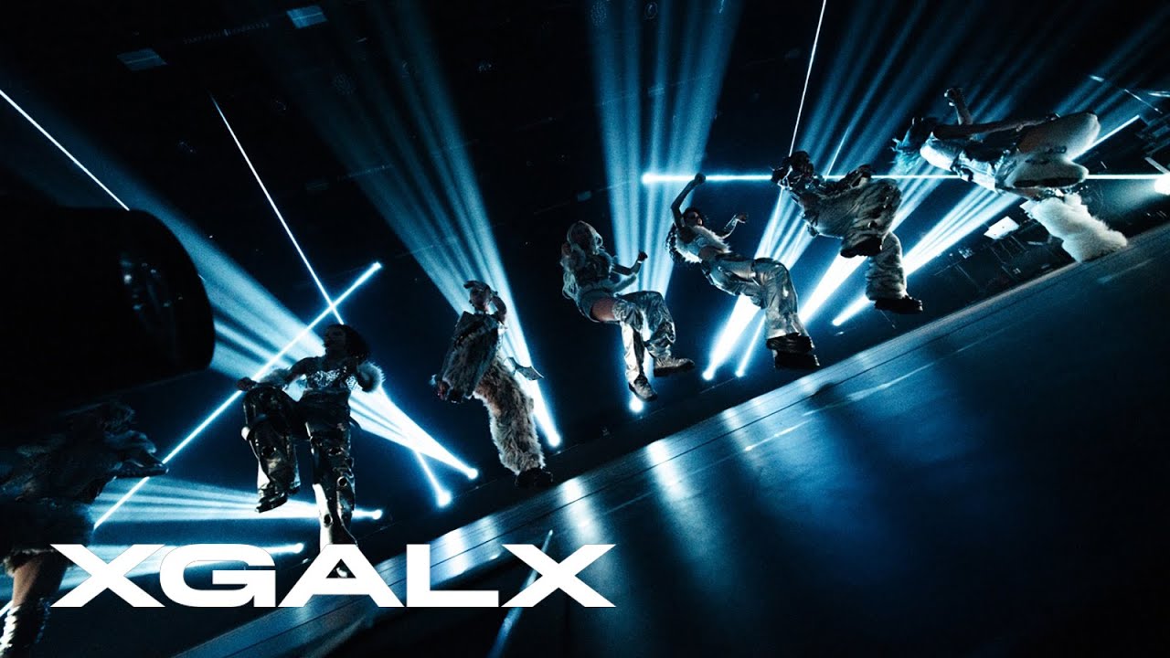 XG during the first HOWL world tour in the MILLION PLACES official music video