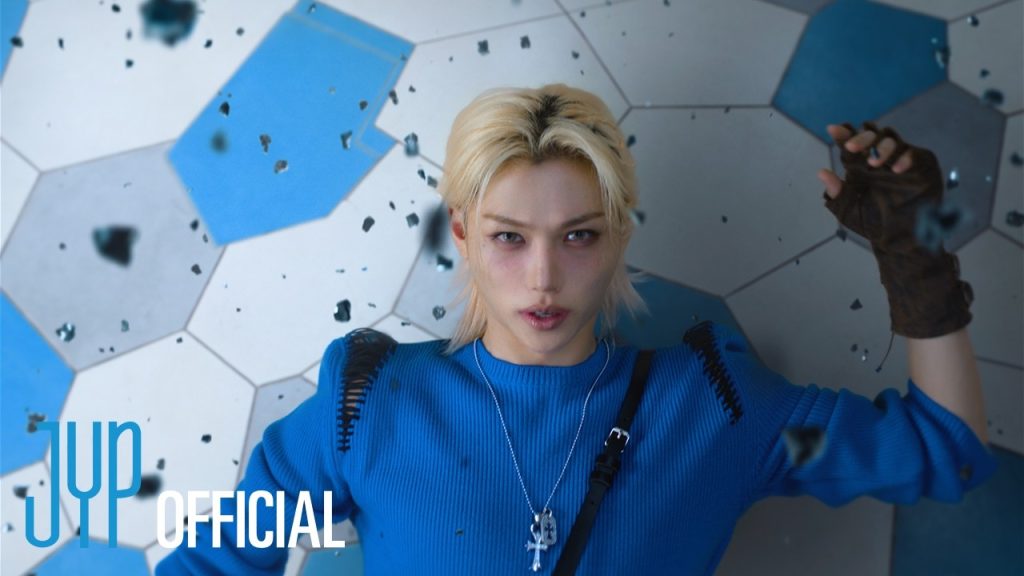 Stray Kids inside the colorful retro computer-game world of the FARMING official video