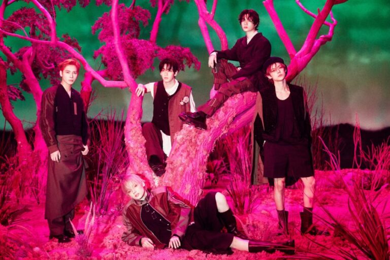 All five TXT members in the featured image for their contract renewal article