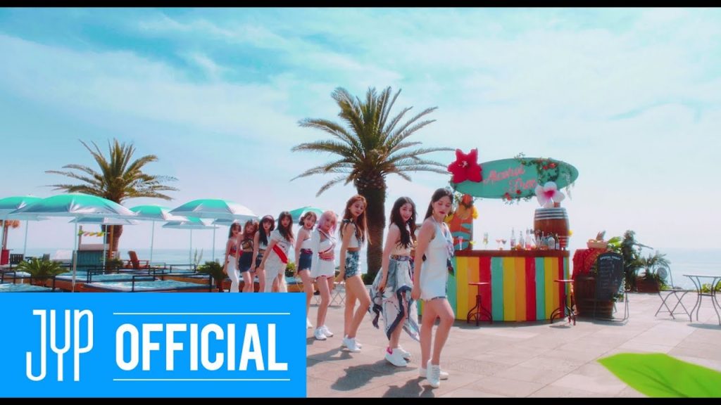 TWICE in the tropical resort setting of the Alcohol-Free official music video