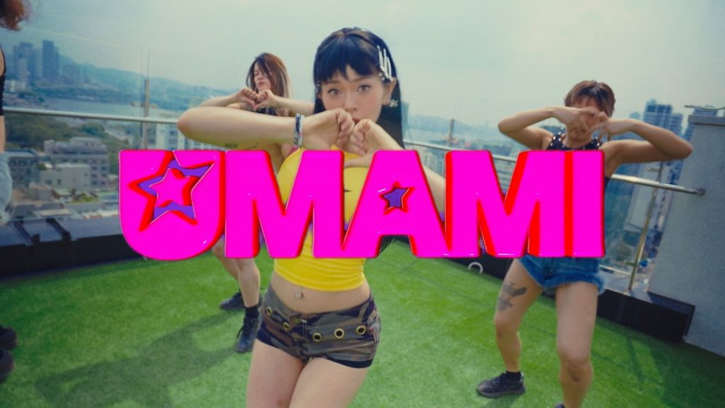 AleXa in the real official UMAMI performance video.