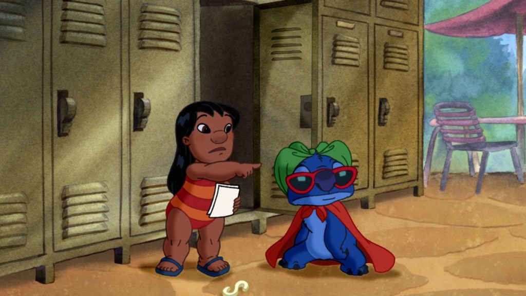 Official episode still of Lilo pointing beside Stitch in a superhero costume during the Cannonball episode