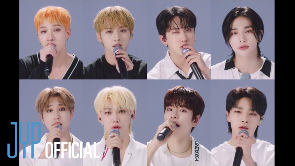 Stray Kids in rain imagery from the official Secret Secret video