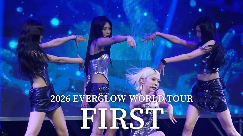 E:U, Sihyeon, Onda and Aisha in a real 2026 four-member performance frame.