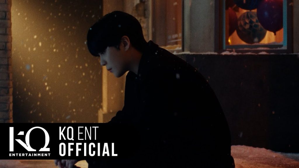 Jongho of ATEEZ in the exact official playlist video reviewed here.