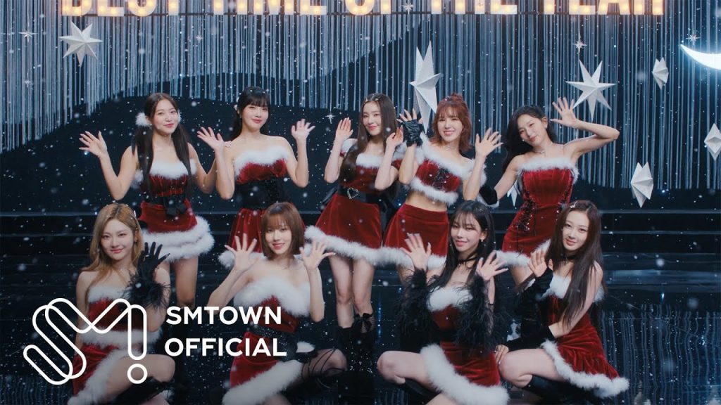Red Velvet and aespa performing together in the Beautiful Christmas official music video