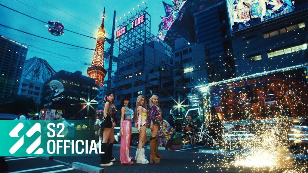 Julie, Natty, Belle and Haneul riding through neon Tokyo in the Lucky official music video