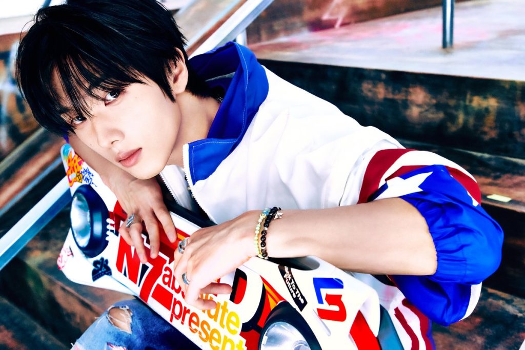 Jisung in a full-color official promotional photograph.