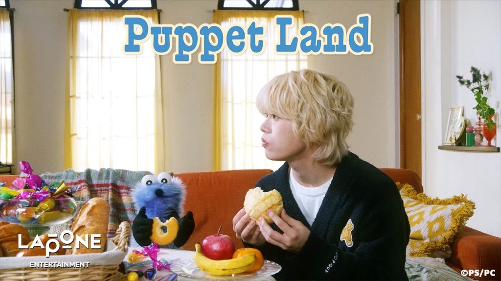 Syoya Kimata performing in the official Puppet Land video