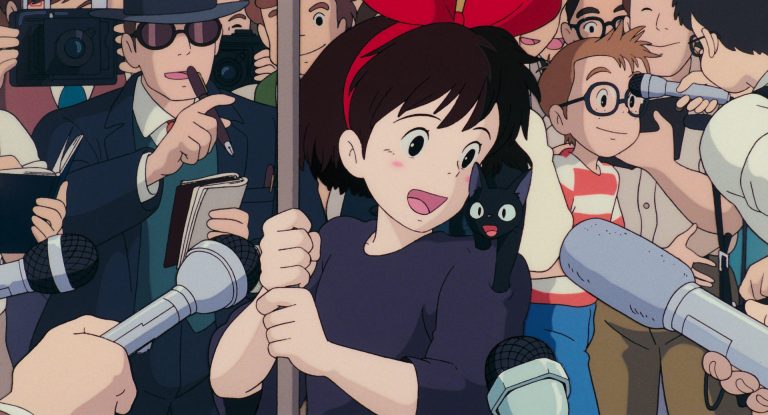 Kiki and Jiji surrounded by reporters after the rescue