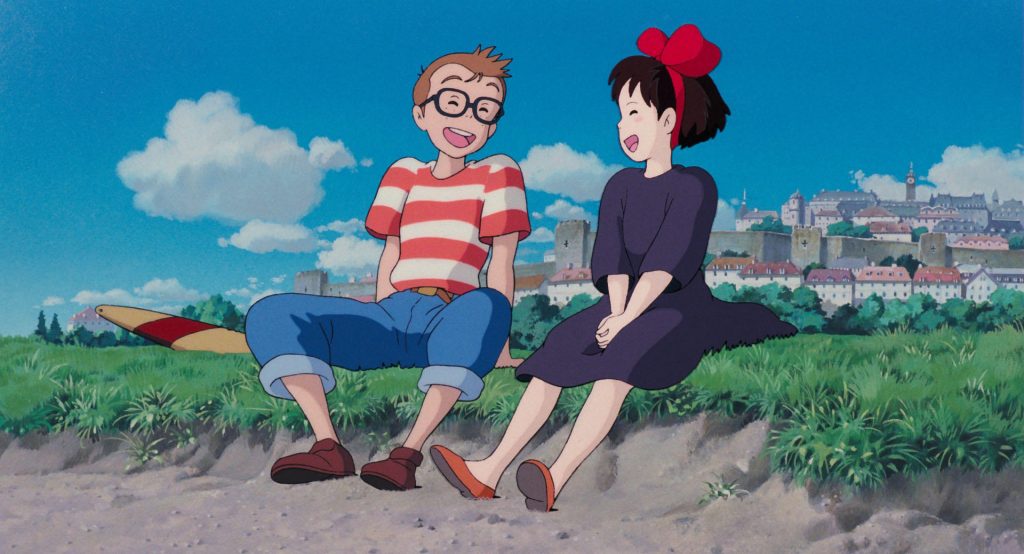 Kiki and Tombo talking together with Koriko behind them