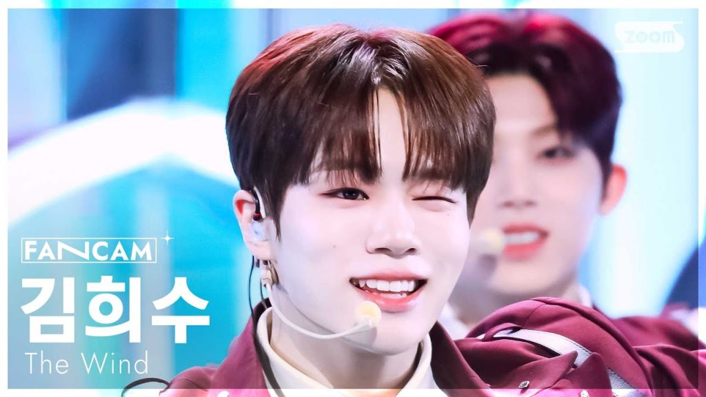 Kim Heesoo in an official broadcast or group performance video.