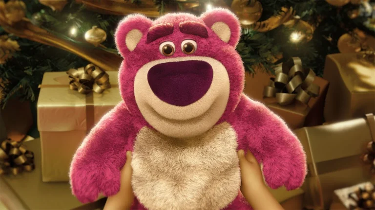 Lots-o-Huggin Bear held in front of wrapped gifts in an official Toy Story 3 image