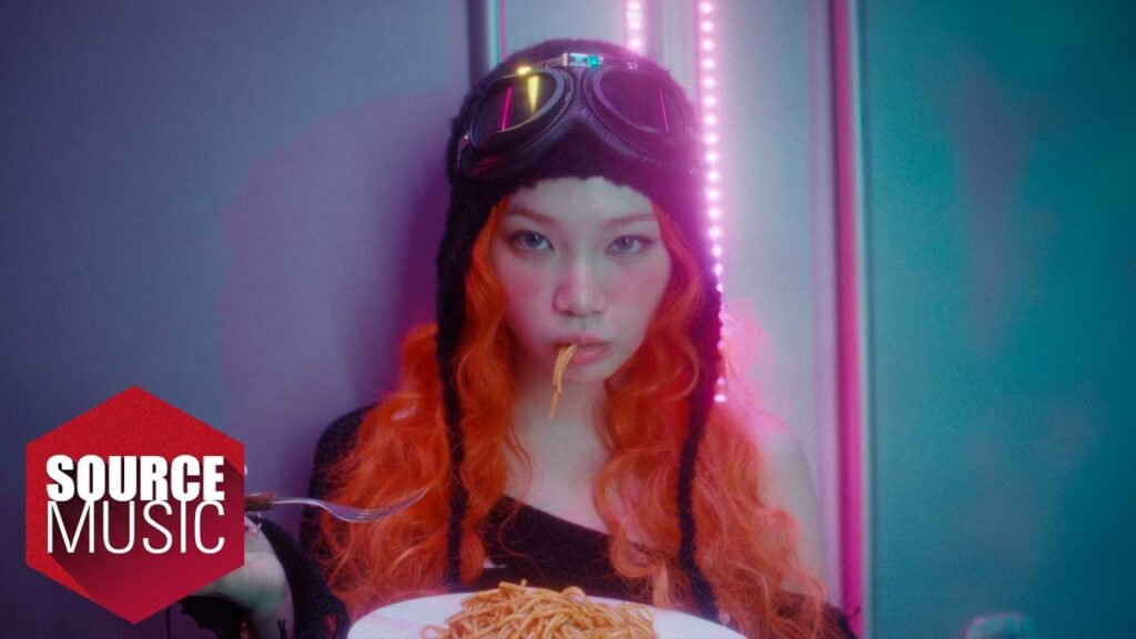 LE SSERAFIM members Sakura, Chaewon, Yunjin, Kazuha and Eunchae with j-hope in the SPAGHETTI music video