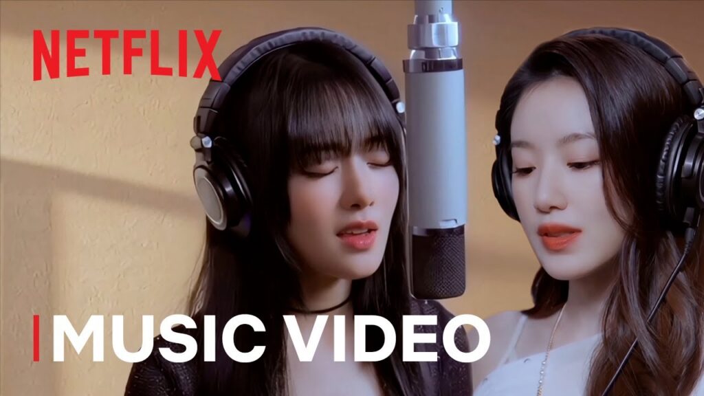 Minnie and Shuhua in the Burn Me Into the Light music video