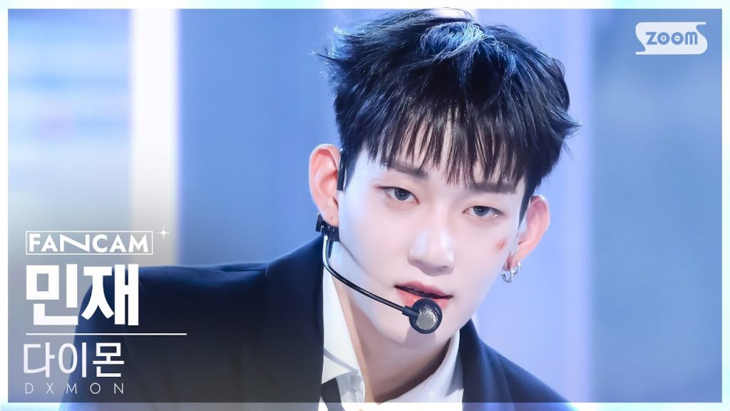 Minjae in an official broadcast performance video.