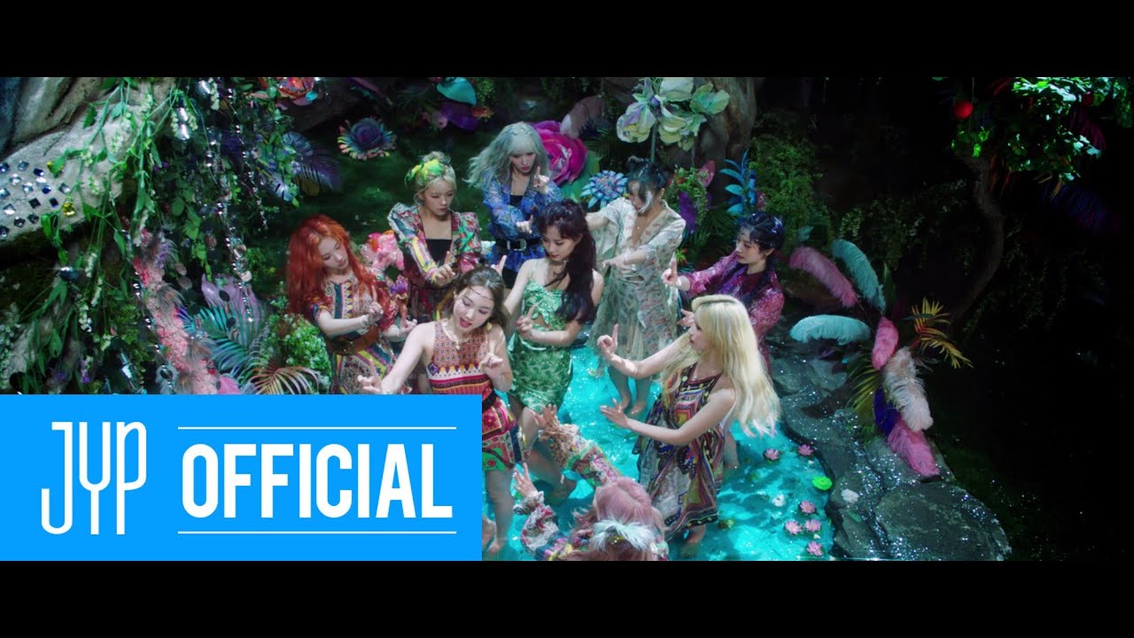 MORE & MORE: TWICE Planted Desire in a Neon Garden and Let It Eat the Fence