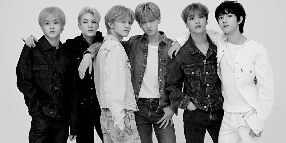 NCT DREAM current members Renjun, Jeno, Haechan, Jaemin, Chenle, and Jisung in a six-member promotional portrait