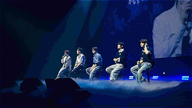 NOWZ members performing at their first fan concert Run with me NOW in Seoul