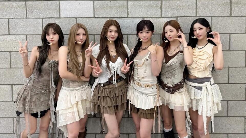 PURPLE KISS members in a 2025 RBW promotional group photo