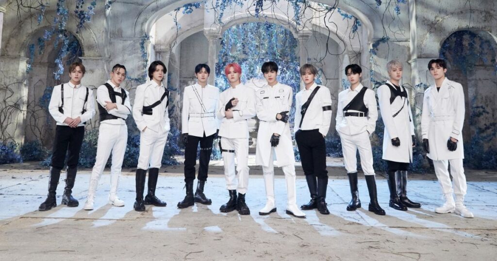 TREASURE current ten members in coordinated white outfits for their 2025 era