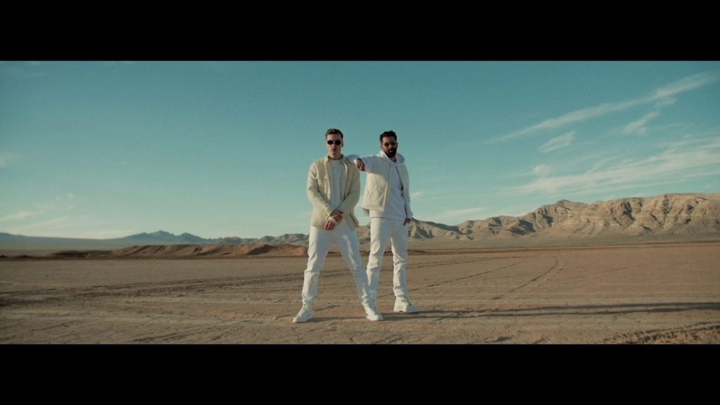 Jim Aasgier and Nizzle of Yellow Claw in official Open music video imagery