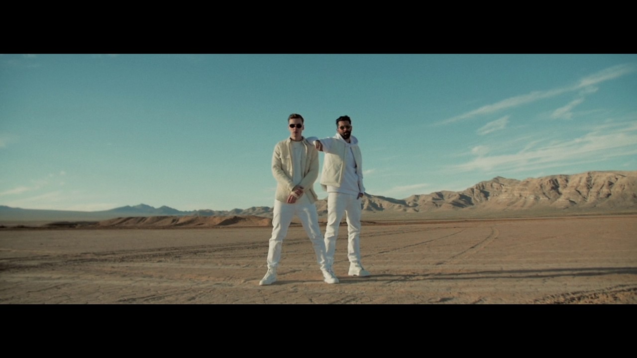 Jim Aasgier and Nizzle of Yellow Claw in official Open music video imagery