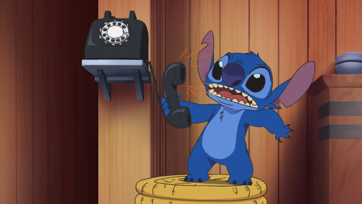 Yuna, Stitch, and Yuna’s father during the ocean emergency in the official Apple TV still for Stitch anime season two Episode 11