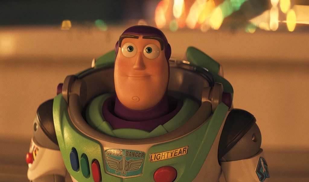 Buzz Lightyear looking toward Woody during the Toy Story 4 carnival farewell
