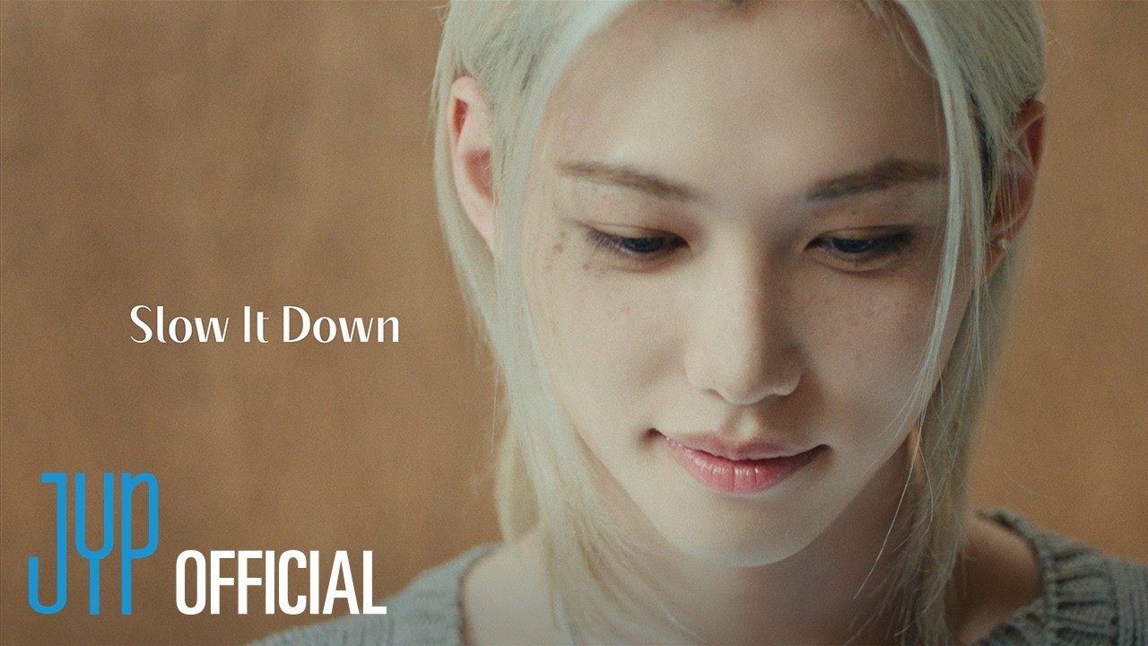 Felix in a quiet blue-toned scene from the Slow It Down SKZ-PLAYER video